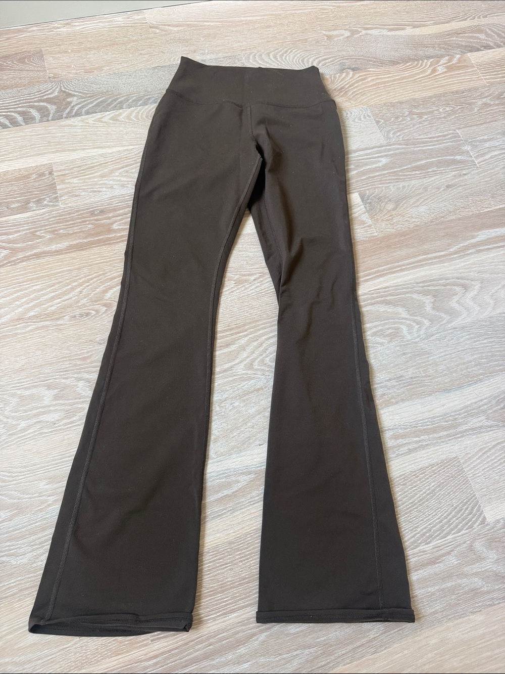 ALO Yoga Flared Leg High-Rise Leggings in Dark Brown - Picture 1 of 2